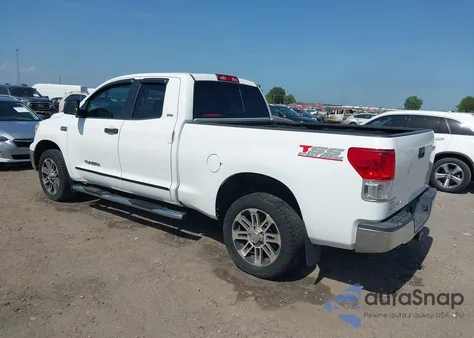 2012 Toyota Tundra Grade 5.7L V8 z USA, uszkodzony, nr VIN 5TFUW5F19CX258672